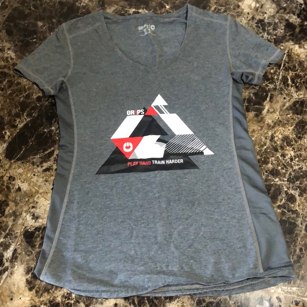 Grips Women’s Grey V Neck T shirt. Size: S